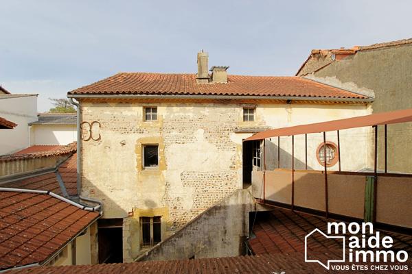 Maison de ville à rénover 480m2 -12 pièces-