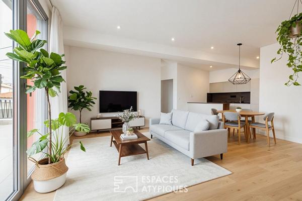 Appartement au dernier étage baigné de lumière à deux pas du Marché Central