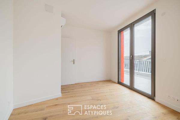 Appartement au dernier étage baigné de lumière à deux pas du Marché Central