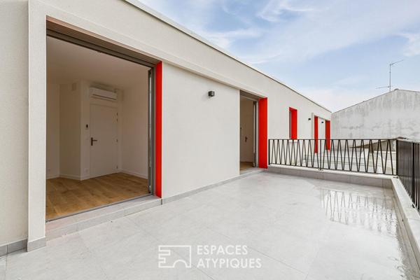 Appartement au dernier étage baigné de lumière à deux pas du Marché Central