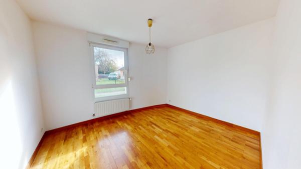 Appartement 3 pièces Rixheim – Rez-de-jardin calme avec terrasse, cave et garage fermé