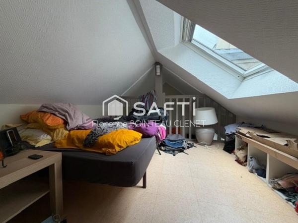 T2 en triplex vendu loué, secteur Saint Serge.