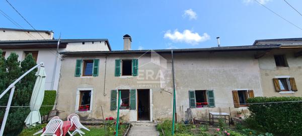 Maison à rénover avec jardin attenant et dépendances