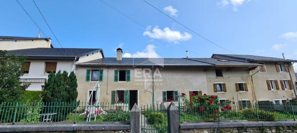 Maison à rénover avec jardin attenant et dépendances