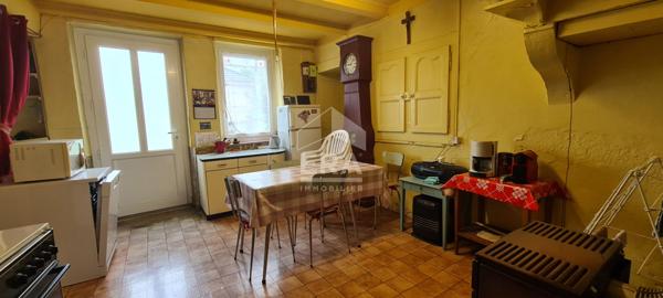 Maison à rénover avec jardin attenant et dépendances