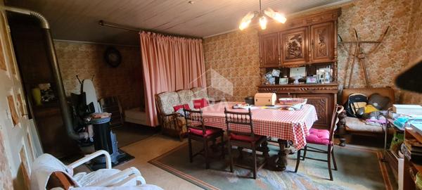 Maison à rénover avec jardin attenant et dépendances