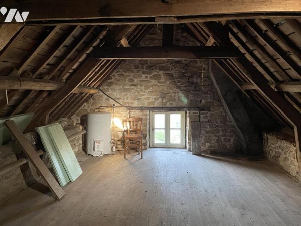 GUIDEL - Maison d'environ 136m² sur 3232m² de terrain non constructible.