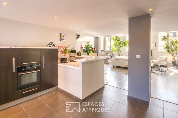 Loft issu de bureaux dans un immeuble remarquable du centre-ville