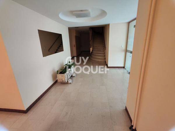 Appartement au centre ville avec garage, dernier étage