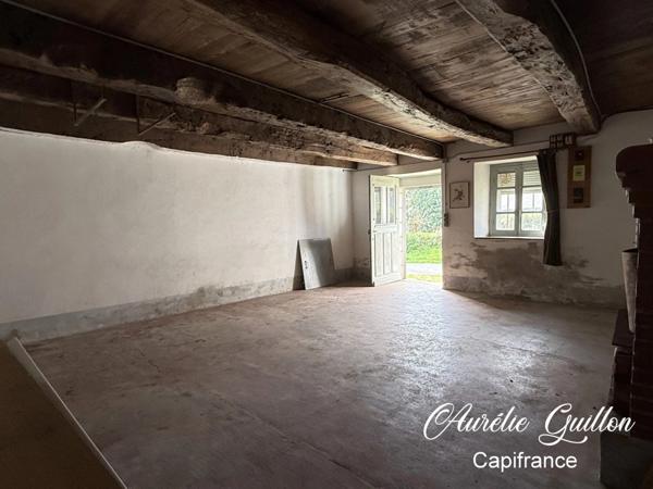 Maison en pierre à réhabiliter – Hangar et beau terrain de 1300 m2 avec puits – Ploërmel