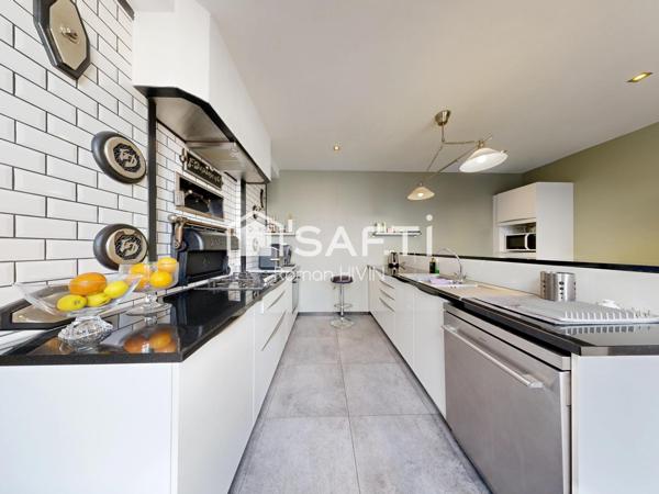 Maison familiale 230 m², jardin 575 m² et grand garage