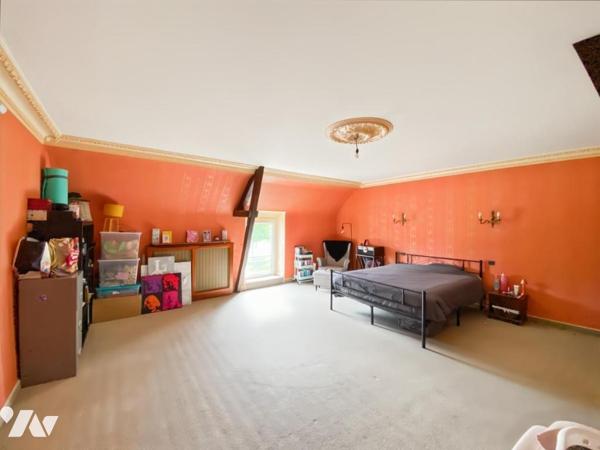 A VENDRE - MAISON EN PIERRES AVEC JARDIN - DOMPIERRE
