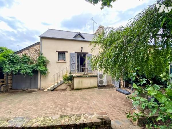 A VENDRE - MAISON EN PIERRES AVEC JARDIN - DOMPIERRE