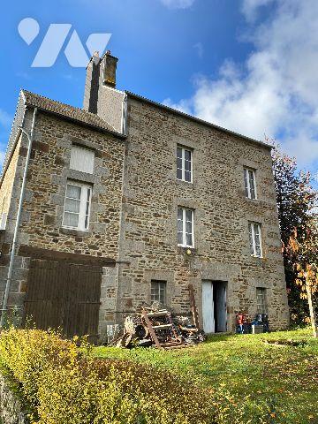 Une maison d'habitation à la sortie de SAINT-GEORGES-DES GROSEILLERS direction CONDE SUR NOIREAU