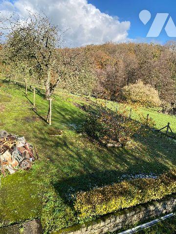 Une maison d'habitation à la sortie de SAINT-GEORGES-DES GROSEILLERS direction CONDE SUR NOIREAU