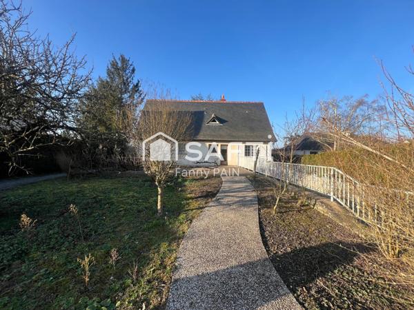 Maison spacieuse avec beau jardin clôturé - Fort potentiel