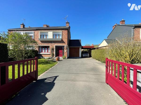Maison semi mitoyenne grand jardin garage carport