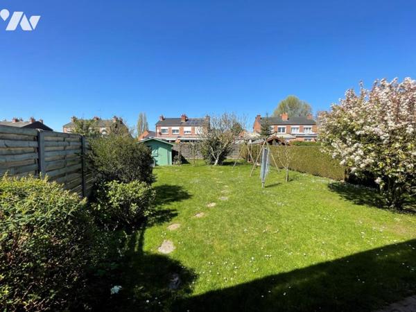 Maison semi mitoyenne grand jardin garage carport