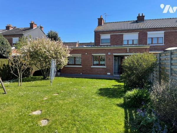 Maison semi mitoyenne grand jardin garage carport