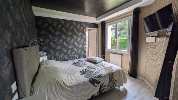 Maison  4 chambres de plain pied avec piscine et garage double