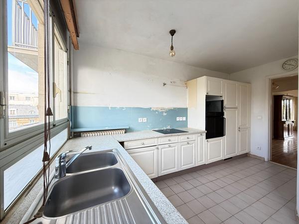 Appartement Asnieres Sur Seine_becon_5 pièce(s) traversant_116 m2_3ème étage_double balcons_deux parking_cave