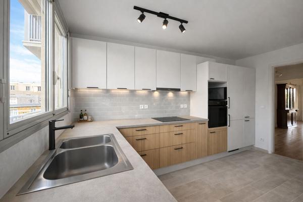 Appartement Asnieres Sur Seine_becon_5 pièce(s) traversant_116 m2_3ème étage_double balcons_deux parking_cave