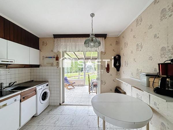 Maison de plain - pied avec véranda