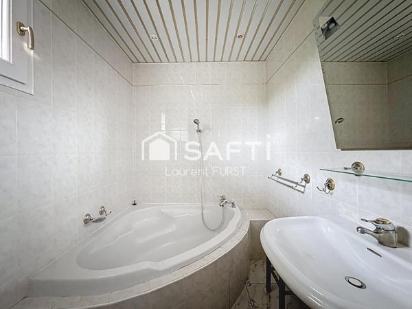 Maison de plain - pied avec véranda