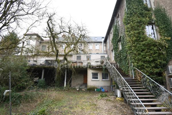 RARE OPPORTUNITÉ IMMOBILIÈRE À LONGUYON – ENSEMBLE DE 1 400 m² SUR PARC ARBORÉ DE 27 ARES ENVIRON