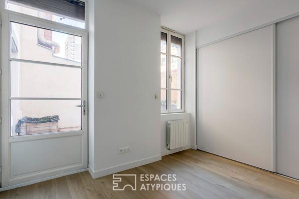 Appartement rénové avec terrasse proche du parc