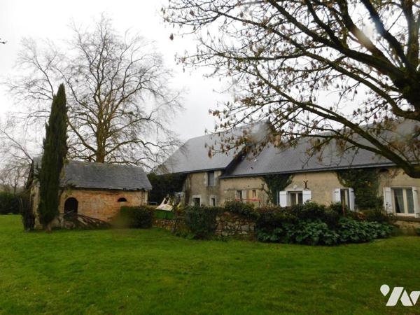Deux maisons avec dépendances et jardin