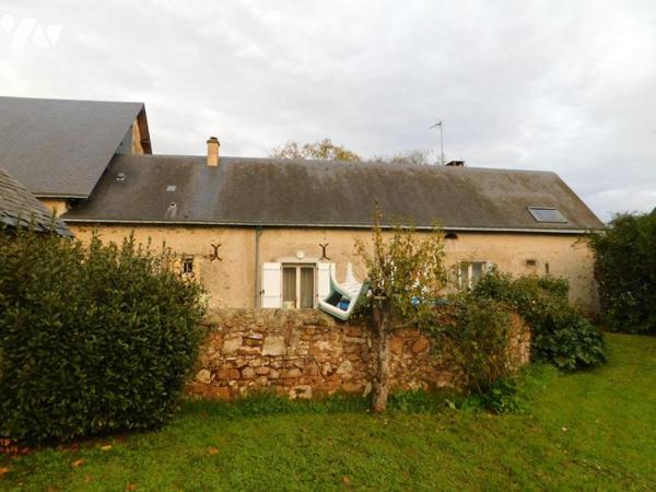 Deux maisons avec dépendances et jardin