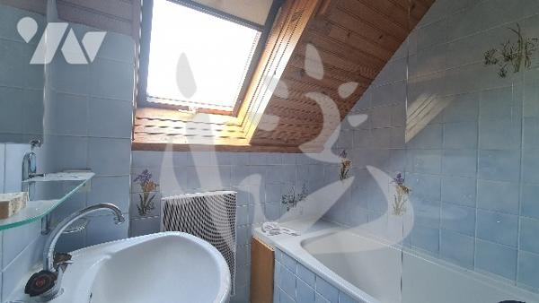 Maison avec véranda 3 chambres + sous-sol total + garage