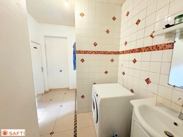 Maison semi individuelle à rénover à Saultain, actuellement louée /Spécial Investisseur