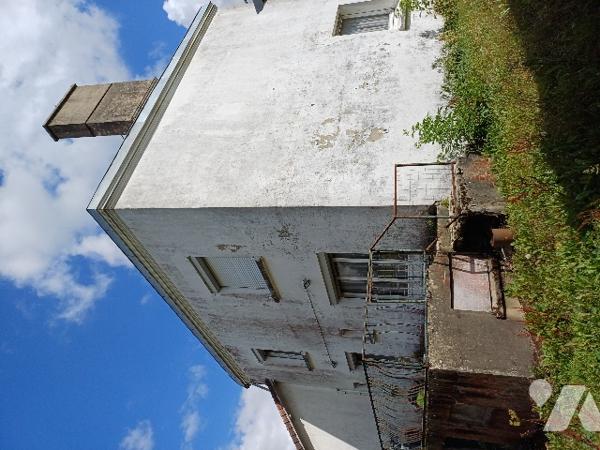 A Neufchâtel-Hardelot, maison d'habitation et son terrain.