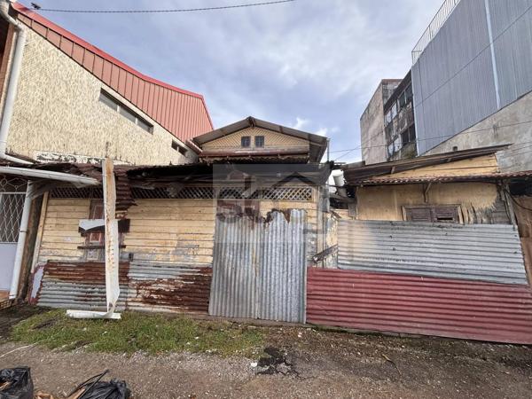 Cayenne centre-ville - Terrain bâti 80 m² zone UA1 — Potentiel R+3/R+4 — Idéal investisseur