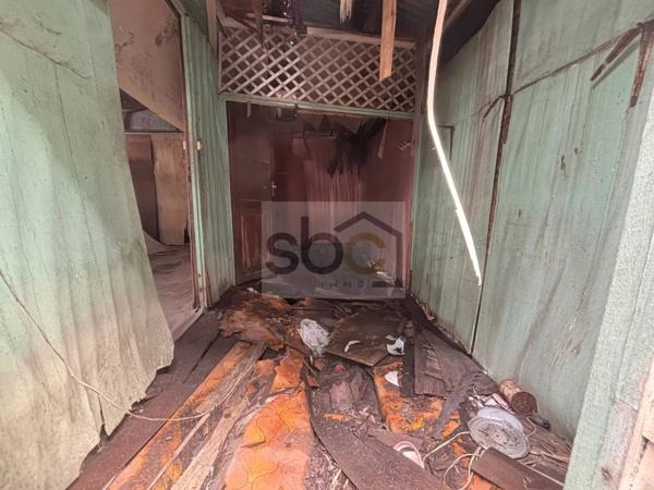 Cayenne centre-ville - Terrain bâti 80 m² zone UA1 — Potentiel R+3/R+4 — Idéal investisseur