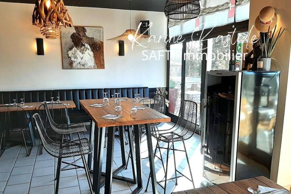 Immeuble mixte a vocation de commerce et d habitation