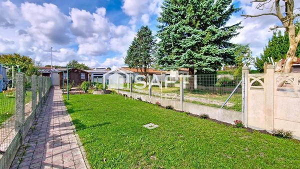 Charmante semi-Flamande de 111m² lumineuse et sans travaux. Jardin, garage et stationnement privatif. DPE B