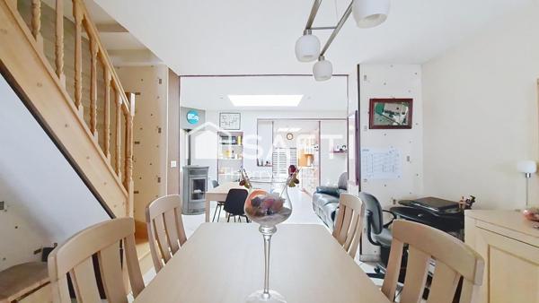 Charmante semi-Flamande de 111m² lumineuse et sans travaux. Jardin, garage et stationnement privatif. DPE B