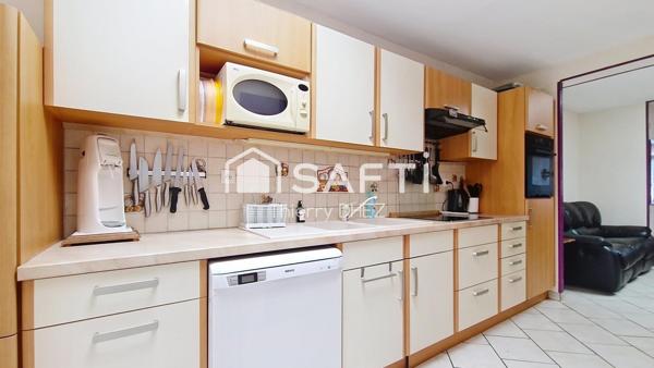 Charmante semi-Flamande de 111m² lumineuse et sans travaux. Jardin, garage et stationnement privatif. DPE B