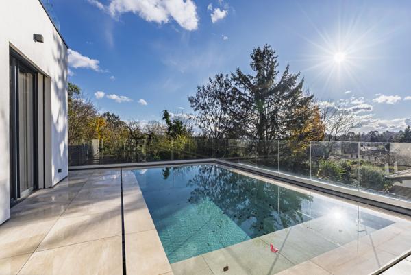 Saint-Cyr-au-Mont-d'Or (69450) à vendre SAINT CYR AU MONT D'OR, villa bioclimatique de 2021 - 180 m2 P7 -garage 130 m2-piscine chauffée