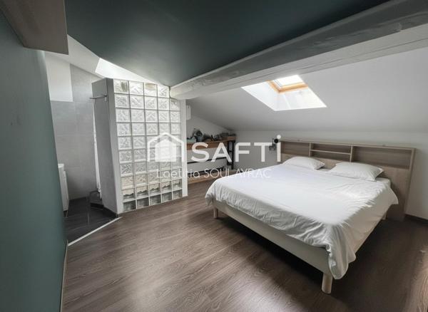 Bel appartement en centre ville, avec cave et jardin.