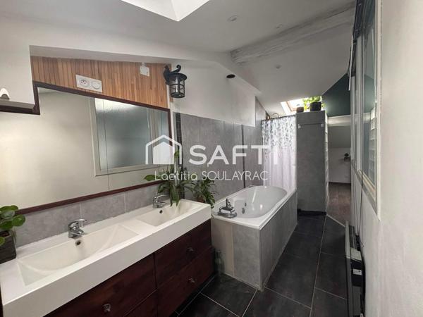 Bel appartement en centre ville, avec cave et jardin.