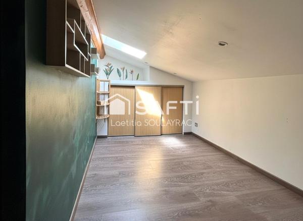 Bel appartement en centre ville, avec cave et jardin.