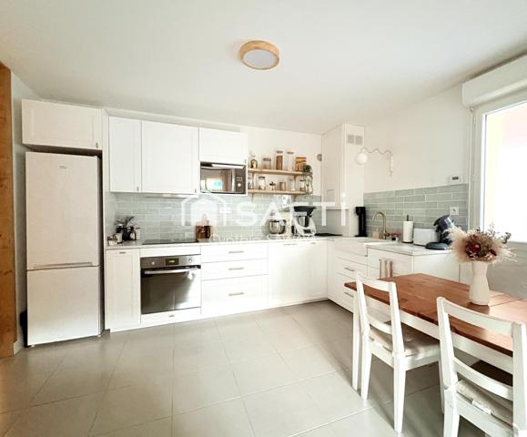 Appartement en RDJ rénové avec goût avec belle terrasse