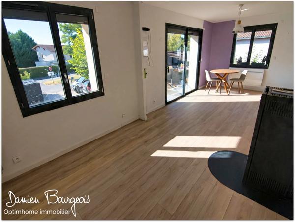 Appartement T4 avec balcon, véranda et 2 places de parking – Centre de Ségny