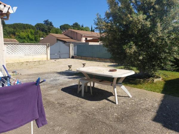 Maison d'habitation de plain pied avec garage sur terrain de 560m2