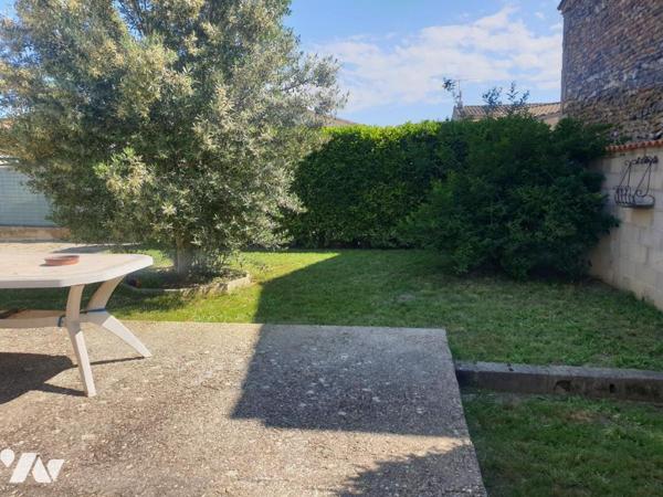 Maison d'habitation de plain pied avec garage sur terrain de 560m2