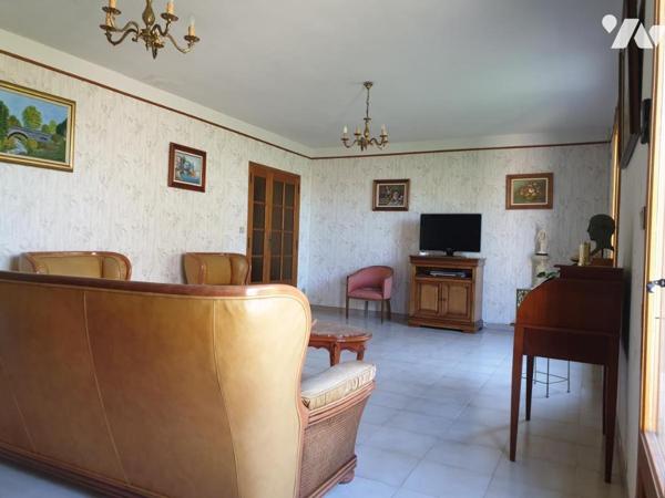 Maison d'habitation de plain pied avec garage sur terrain de 560m2